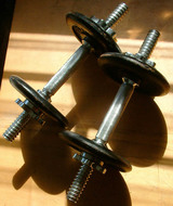 Weights by GeorgeStepanek https://commons.wikimedia.org/wiki/File:TwoDumbbells.JPG